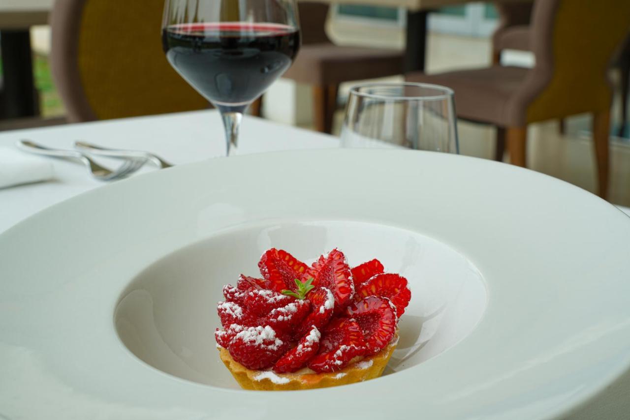 Hotel Pisa Tower Plaza Exterior foto A dessert at the restaurant